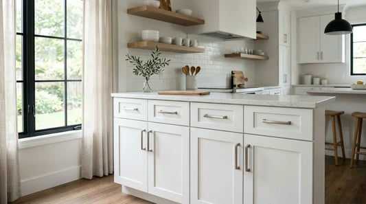 A modern kitchen with stylish cabinet handles on white shaker cabinets, showcasing a simple DIY upgrade.